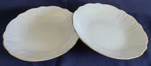 Lade das Bild in den Galerie-Viewer, Zwei weiße Porzellansuppenteller von RETSCH & CO. mit Goldrand, gewölbtem Design, Fächer- und Linienrelief-Dekor.