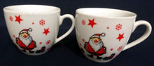 Lade das Bild in den Galerie-Viewer, KAFFEETASSE &quot;Santa&quot;- Porzellan, Weihnachtsmann Nikolaus Sterne Schneeflocken Geschenke Motiv Dekor
